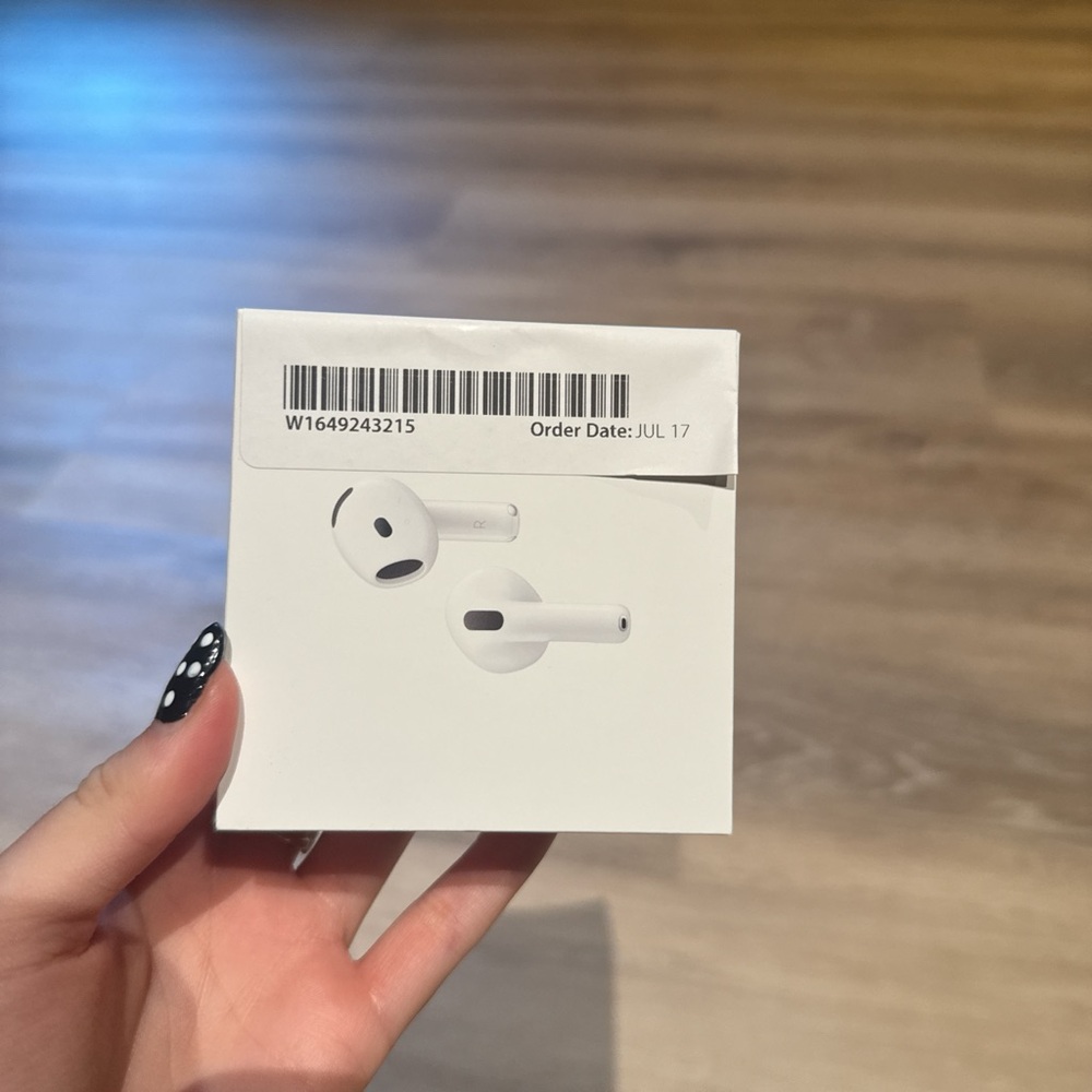 Apple AirPods with Charging Case - White